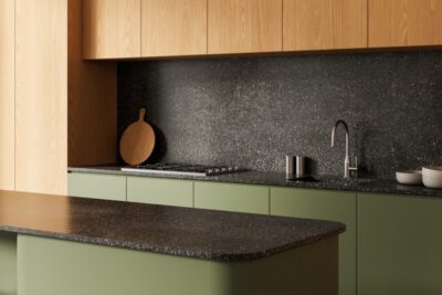 Modern kitchen interior with matte green cabinets